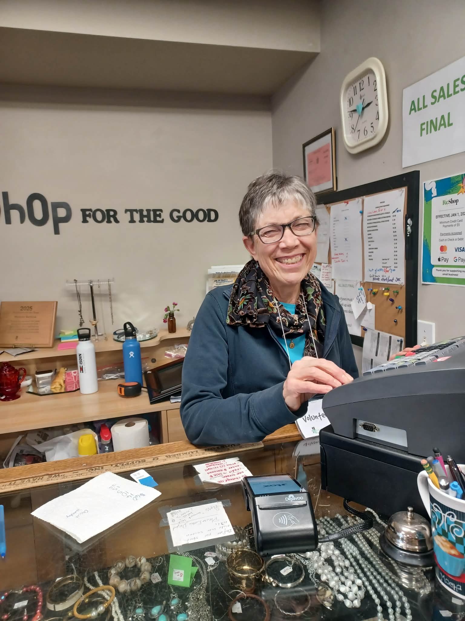volunteer hugging homeowner